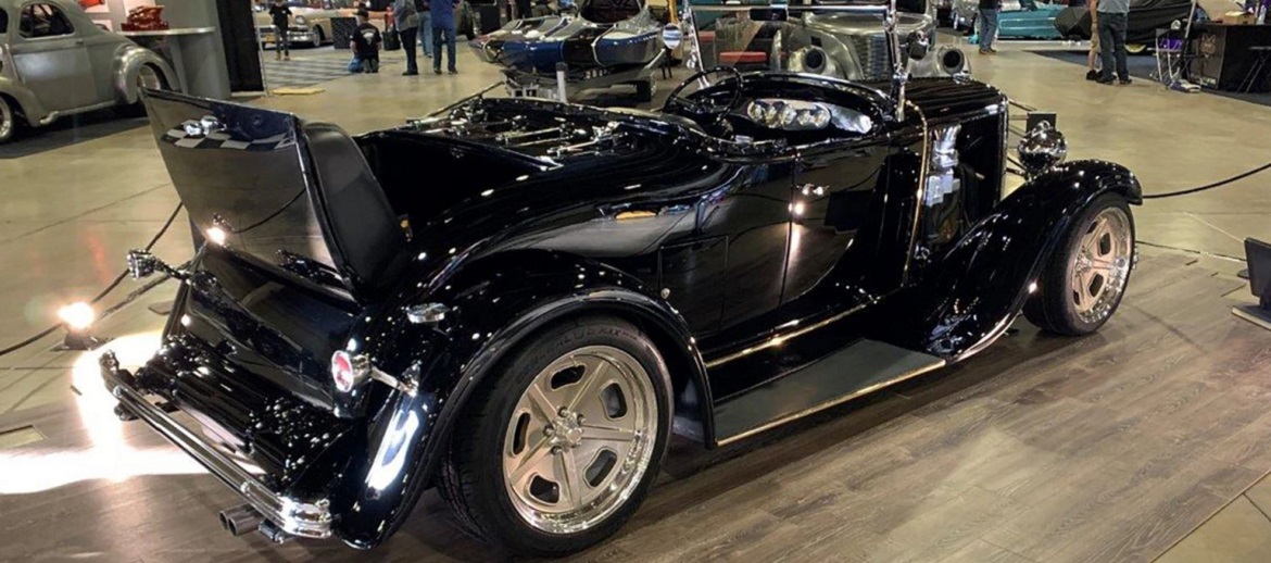 '29 black Dodge DA raodster in a showroom