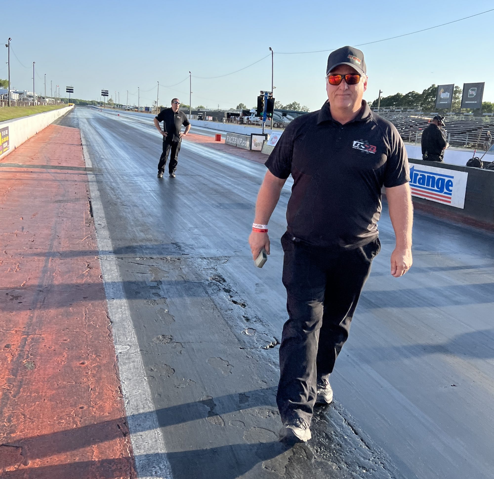 Man standing on drag strip