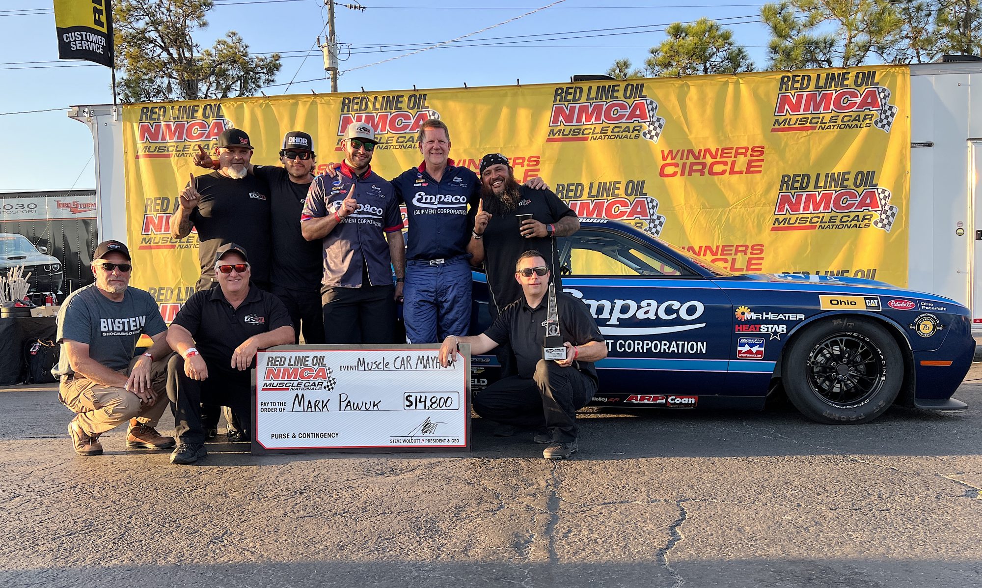 race team celebrating a win