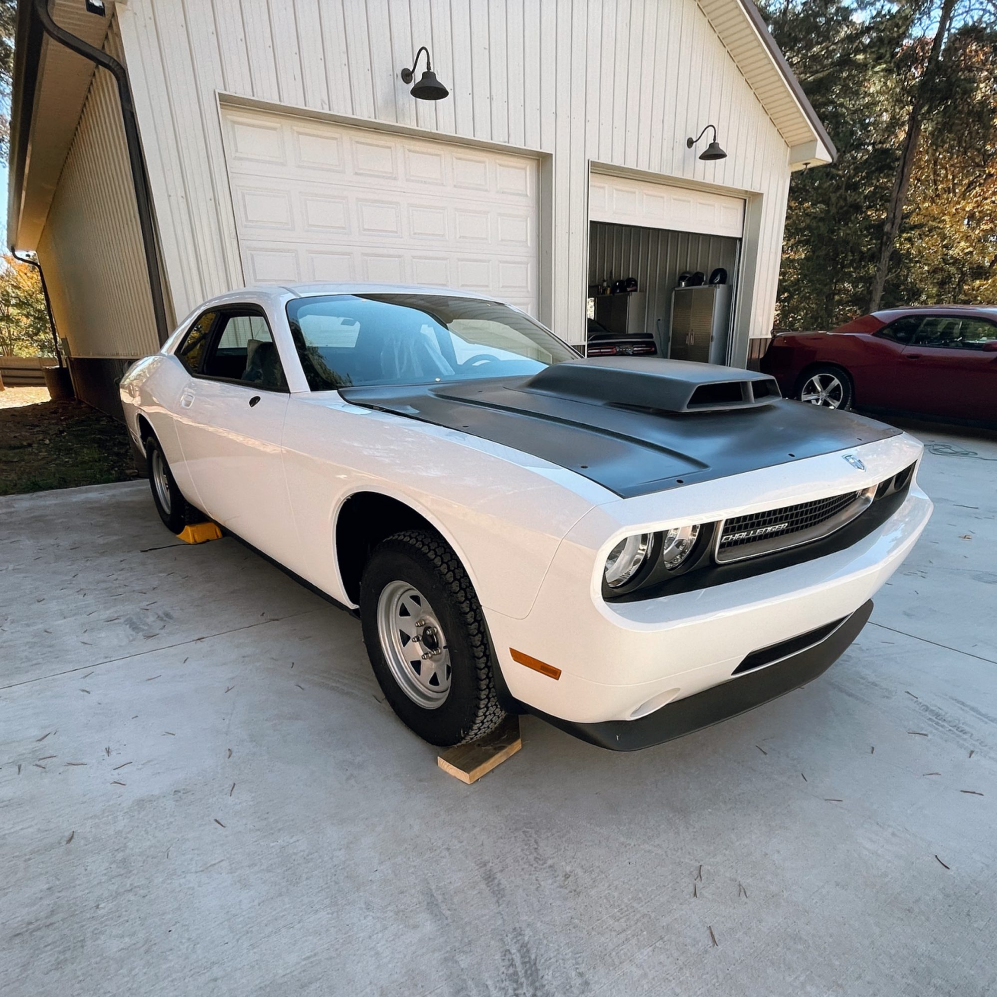 race car sitting in a driveway