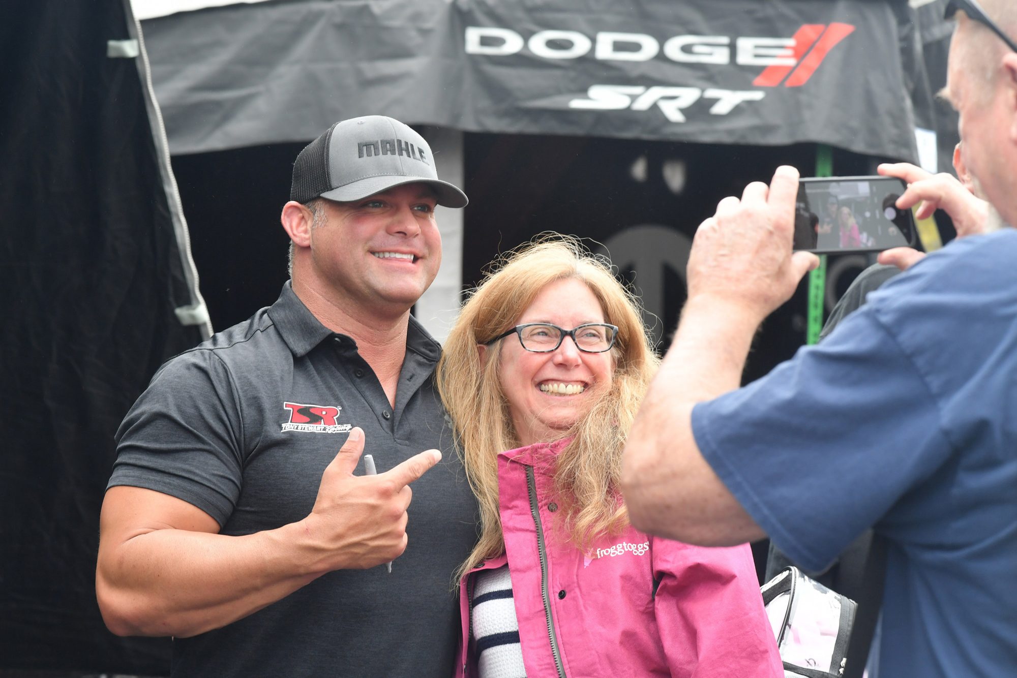 Matt Hagan taking a pic with a fan