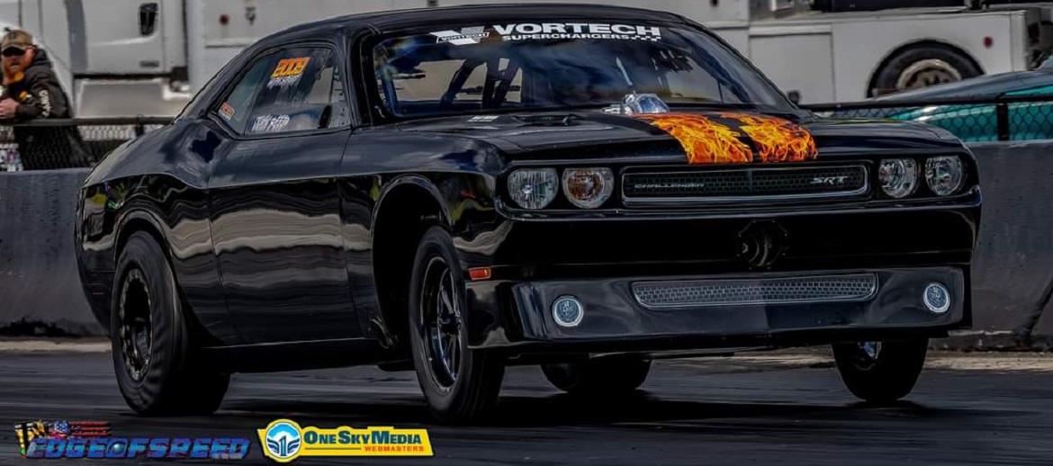 john reed's black challenger with flame stripes