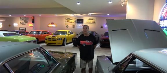 Chris Lehuede with his car collection